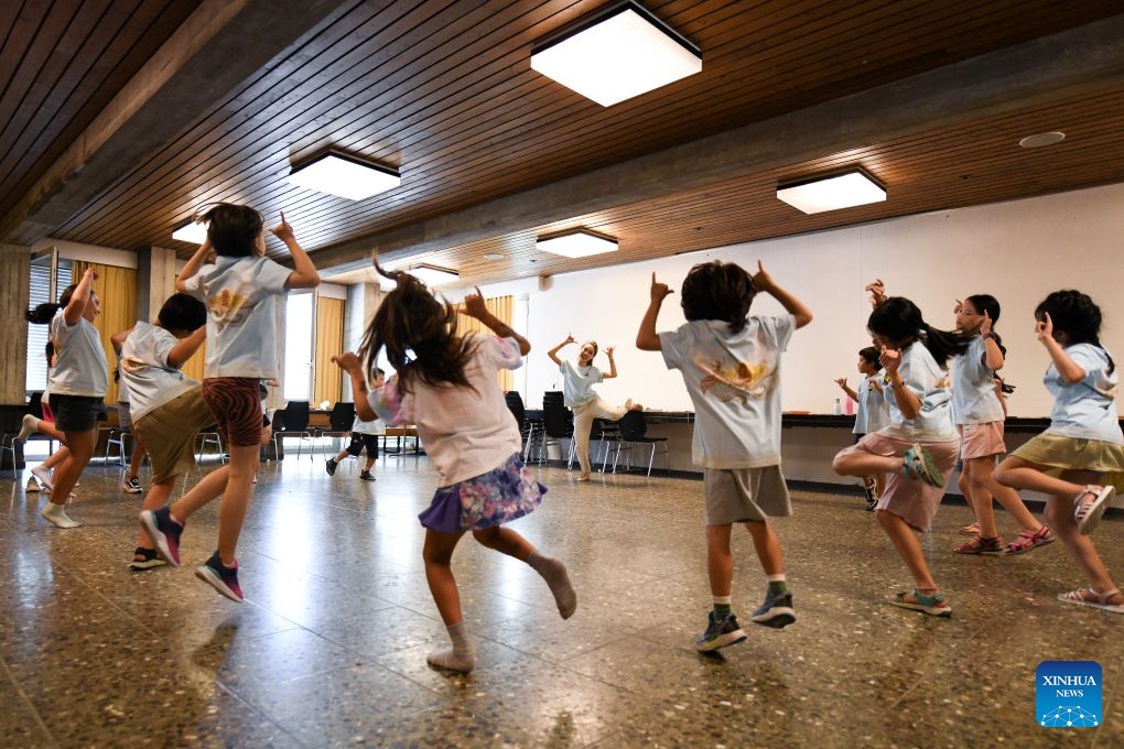 Children learn Chinese ethnic dance during a Chinese culture summer camp in Bern, Switzerland, July 14, 2026. A summer camp featuring traditional Chinese culture opened here on Tuesday. (Photo: Xinhua)