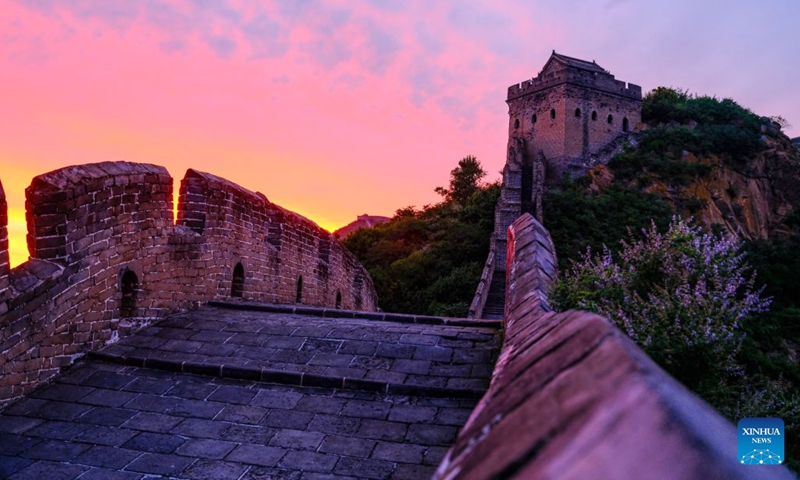 This photo shows a view of the Jinshanling section of the Great Wall at sunrise at Luanping County of Chengde City, north China's Hebei Province, July 16, 2026. (Photo: Xinhua)