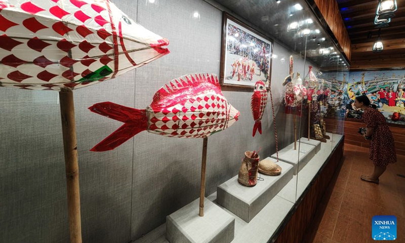 People visit a Geng Lu Bu museum in Qionghai, south China's Hainan Province, July 26, 2026. 