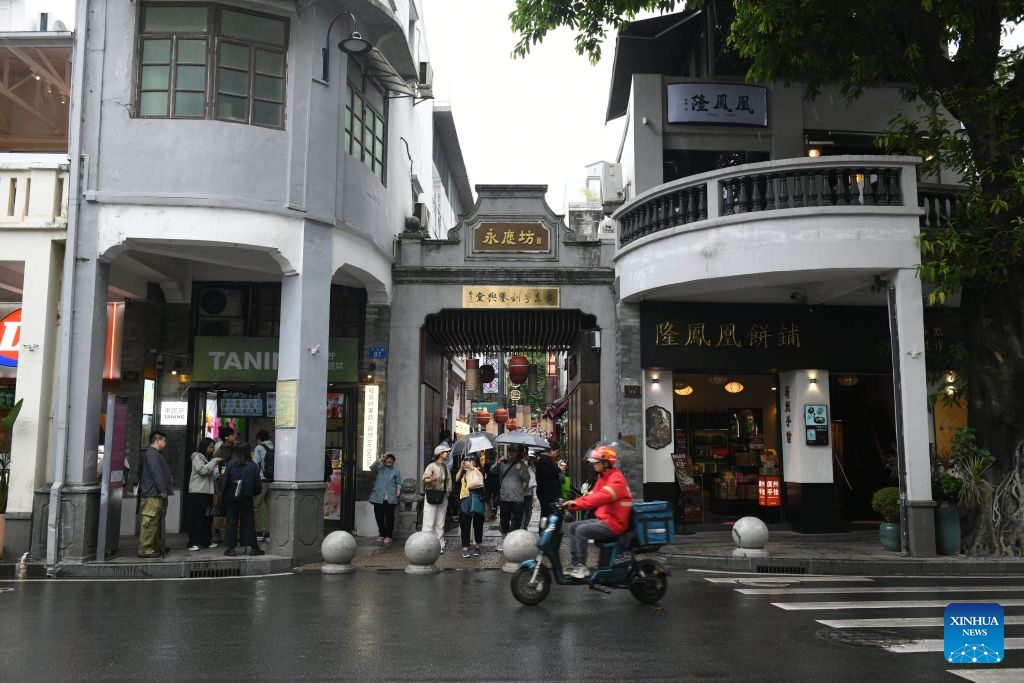 This photo taken on Oct. 22, 2025 shows a renovated historical and cultural residential compound in Liwan District of Guangzhou City, south China's Guangdong Province. During China's 14th Five-Year Plan period (2021-2025), over 240,000 old urban residential compounds were renovated across the country, benefiting more than 40 million households and 110 million residents. (Photo: Xinhua)