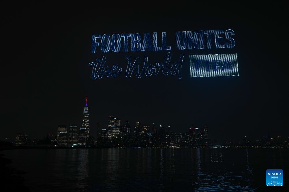 A drone show featuring the FIFA World Cup 2026 is displayed with the Manhattan skyline in the back drop in New Jersey, the United States, on July 15, 2026. (Xinhua/Huang Zongzhi)