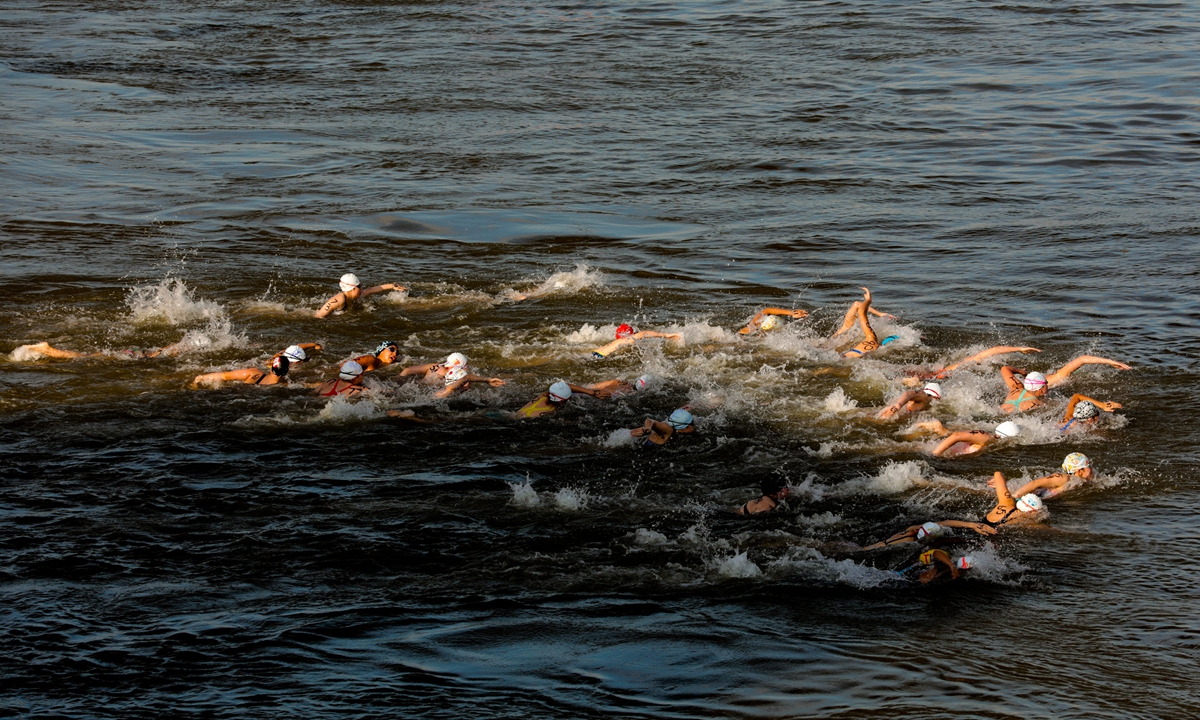 Participants swim across the Yangtze River during the 2026 (51st) Yangtze River Crossing Festival in Wuhan, Central China's Hubei Province on July 16. Photo: VCG