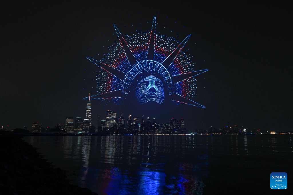 A drone show featuring the FIFA World Cup 2026 is displayed with the Manhattan skyline in the back drop in New Jersey, the United States, on July 15, 2026. (Xinhua/Huang Zongzhi)
