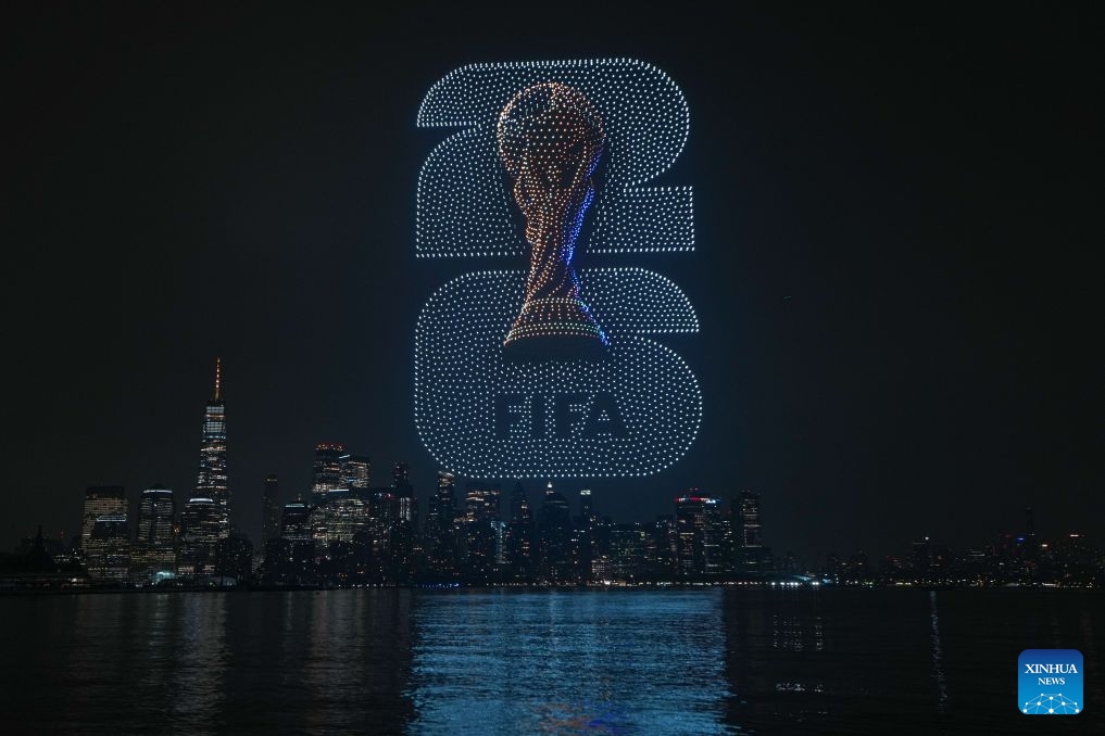 A drone show featuring the FIFA World Cup 2026 is displayed with the Manhattan skyline in the back drop in New Jersey, the United States, on July 15, 2026. (Xinhua/Huang Zongzhi)