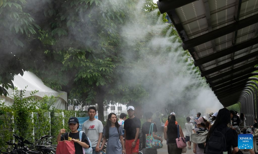 People cool off at a park during a heatwave in Seoul, South Korea, July 17, 2026. (Photo: Xinhua)
