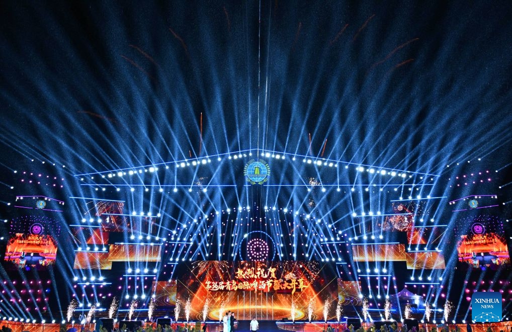 A light show is staged during the opening of the 36th Qingdao International Beer Festival at Xihai'an (West Coast) New Area in Qingdao, east China's Shandong Province, on July 17, 2026. The 36th Qingdao International Beer Festival opened on Friday evening in the coastal city of Qingdao, east China's Shandong Province, kicking off a 30-day celebration that blends brewing tradition with tech advances and cultural performances. Running until Aug. 15, the festival boasts nine beer tents offering more than 2,300 varieties from around the world, including premium craft brews and fruit-flavored beers. (Photo: Xinhu)