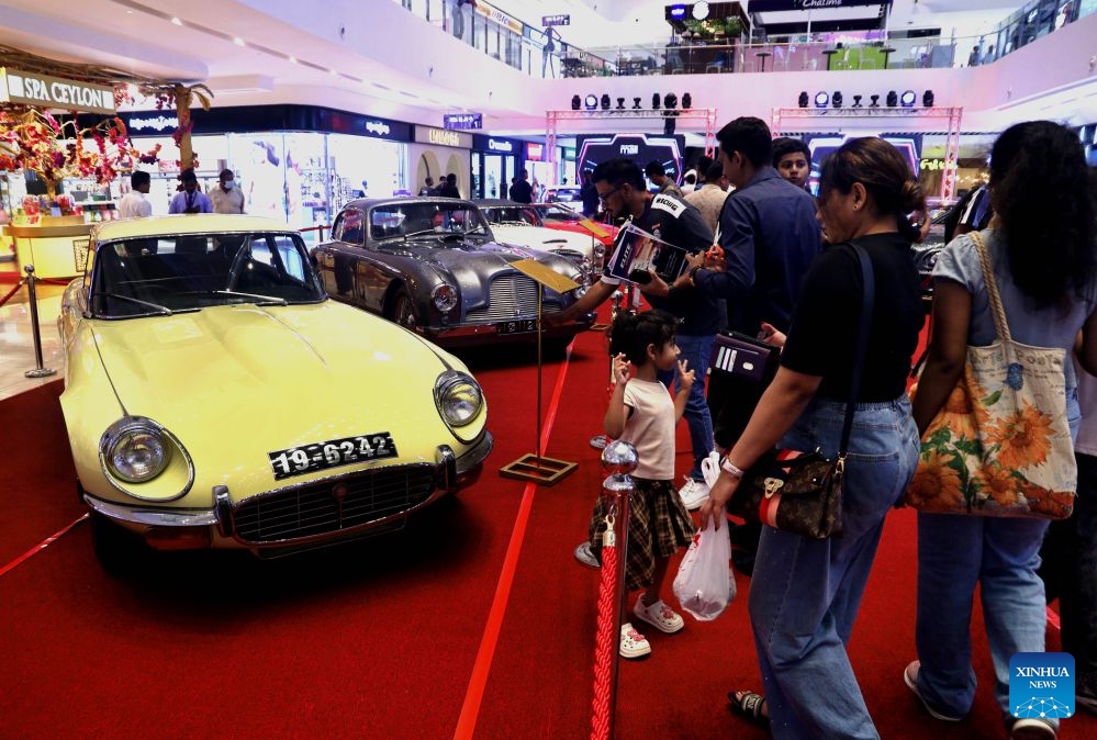 People view classic cars during a show in Colombo, Sri Lanka, on July 18, 2026. A classic car show was held on Saturday at the Havelock City Mall in Colombo. (Photo: Xinhua)