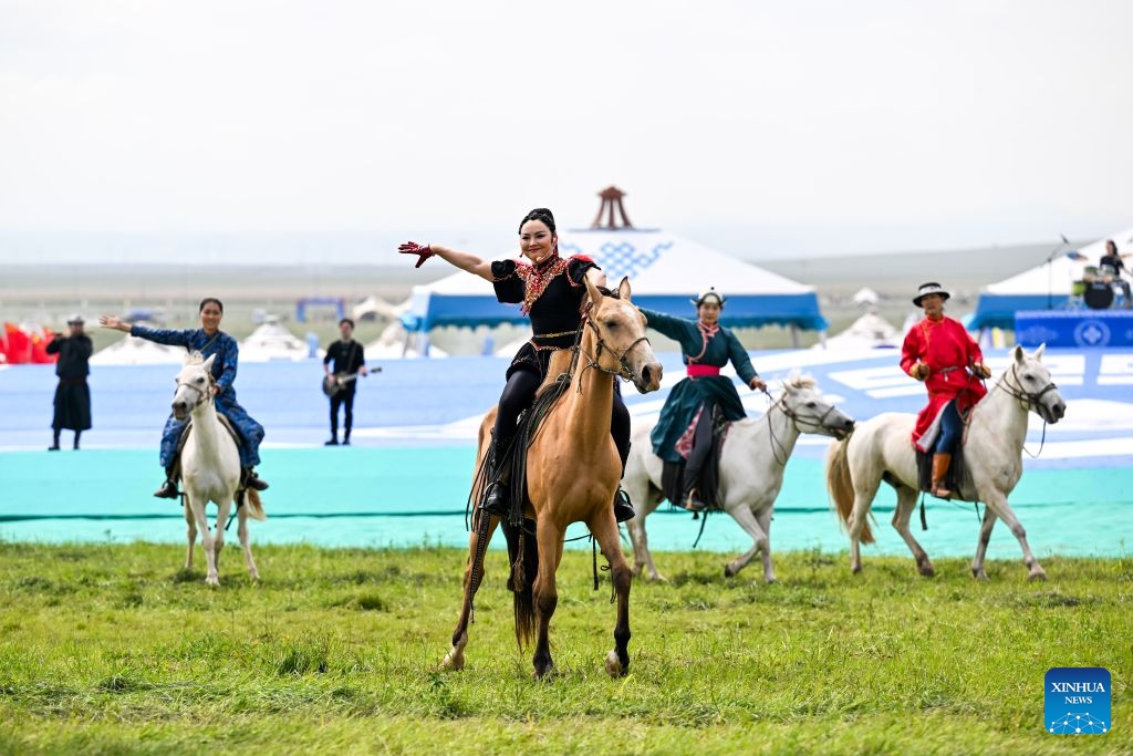 Artists perform at the opening ceremony of the 36th Naadam festival in Xilin Gol League, north China's Inner Mongolia Autonomous Region, July 18, 2026. The Naadam festival kicked off here on Saturday. Naadam, usually held in mid-summer and sometimes in winter in pastoral areas of Inner Mongolia, means games in the Mongolian language. It often comprises wrestling, archery, and horse racing, also known as the Three Games of Men. (Photo: Xinhu)