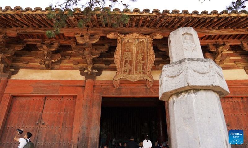 Tourists visit Foguang Temple in Xinzhou City of north China's Shanxi Province, July 15, 2026. Shanxi boasts magnificent natural scenery and landscapes, with three World Cultural Heritage sites including Pingyao, Yungang Grottoes and Mount Wutai, attracting tourists around the world. It is also home to more than 80 percent of the country's surviving timber structures built before the Yuan Dynasty (1271-1368), earning it the reputation of a museum of ancient Chinese architectural art.
Scenic areas across Shanxi have entered their peak season for tourism during summer vacation. Photo: Xinhua