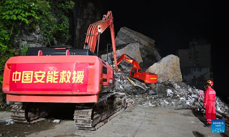 Rescuers work at the site of a landslide in Pengshui Miao and Tujia Autonomous County, southwest China's Chongqing Municipality, July 18, 2026. The geological disaster occurred at 9:08 a.m. on Friday in the Hanjia sub-district of Pengshui Miao and Tujia Autonomous County in Chongqing, burying more than 10 residential buildings. Search and rescue operations are still underway. (Xinhua/Wang Quanchao)