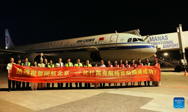 Staff members pose for a group photo at the Manas International Airport in Bishkek, Kyrgyzstan, July 17, 2026. Air China's inaugural direct flight between the capitals of China and Kyrgyzstan officially launched on Friday after flight CA893, departing from Beijing Capital International Airport, successfully landed at Manas International Airport in Bishkek.
According to Air China, regular flights in both directions of the new air service operate three times a week, namely on Mondays, Fridays, and Sundays. Flight CA893 departs from Beijing and travels to Bishkek, with a flight time of five hours 40 minutes; flight CA894 departs from Bishkek and travels to Beijing, with a flight time of four hours 50 minutes. Photo: Xinhua