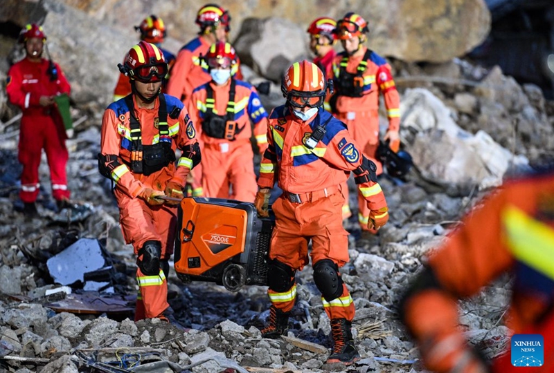 Rescuers work at the site of a landslide in Pengshui Miao and Tujia Autonomous County, southwest China's Chongqing Municipality, July 18, 2026. The geological disaster occurred at 9:08 a.m. on Friday in the Hanjia sub-district of Pengshui Miao and Tujia Autonomous County in Chongqing, burying more than 10 residential buildings. Search and rescue operations are still underway. (Xinhua/Wang Quanchao)