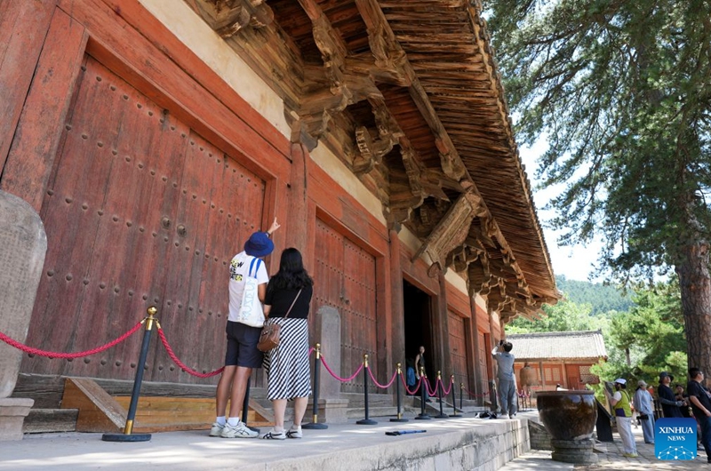 Tourists visit Foguang Temple in Xinzhou City of north China's Shanxi Province, July 15, 2026. Shanxi boasts magnificent natural scenery and landscapes, with three World Cultural Heritage sites including Pingyao, Yungang Grottoes and Mount Wutai, attracting tourists around the world. It is also home to more than 80 percent of the country's surviving timber structures built before the Yuan Dynasty (1271-1368), earning it the reputation of a museum of ancient Chinese architectural art.
Scenic areas across Shanxi have entered their peak season for tourism during summer vacation. Photo: Xinhua