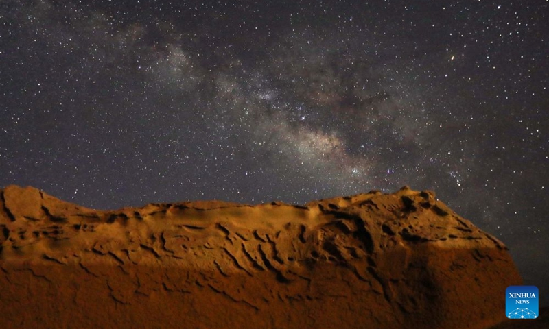 This photo taken on July 18, 2026 shows the Milky Way stretching across the sky above the desert in Fayoum, Egypt. (Xinhua/Ahmed Gomaa)