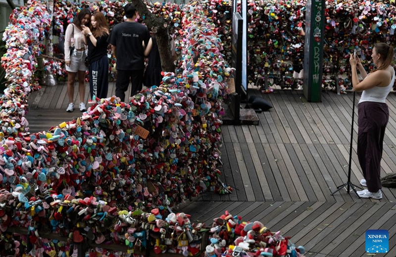 Tourists are seen around the Namsan Seoul Tower in Seoul, South Korea, July, 18, 2026. (Photo by Jun Hyosang/Xinhua)