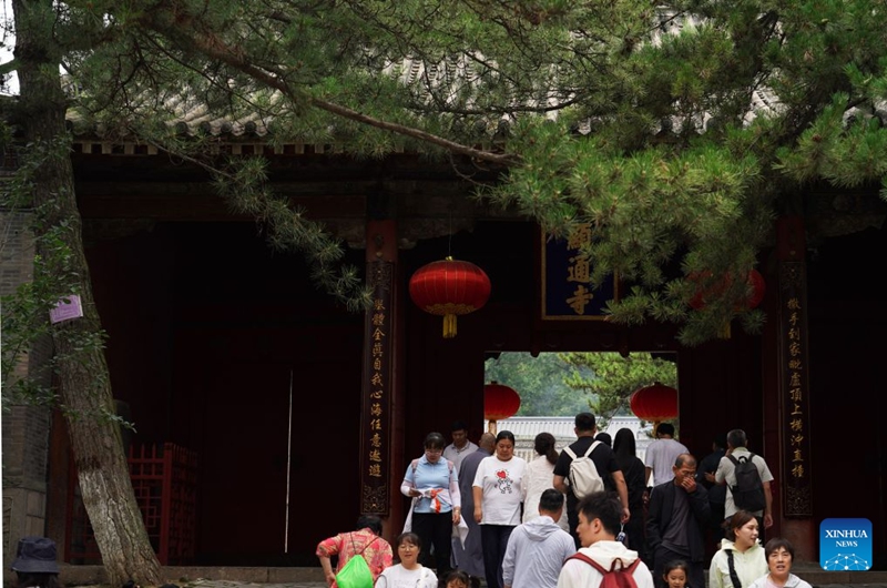 Tourists visit Mount Wutai, one of China's four sacred Buddhist mountains, in Xinzhou City of north China's Shanxi Province, July 16, 2026. Shanxi boasts magnificent natural scenery and landscapes, with three World Cultural Heritage sites including Pingyao, Yungang Grottoes and Mount Wutai, attracting tourists around the world. It is also home to more than 80 percent of the country's surviving timber structures built before the Yuan Dynasty (1271-1368), earning it the reputation of a museum of ancient Chinese architectural art.
Scenic areas across Shanxi have entered their peak season for tourism during summer vacation. Photo: Xinhua