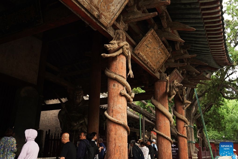 Tourists visit Jinci Temple in Taiyuan, north China's Shanxi Province, July 14, 2026. Shanxi boasts magnificent natural scenery and landscapes, with three World Cultural Heritage sites including Pingyao, Yungang Grottoes and Mount Wutai, attracting tourists around the world. It is also home to more than 80 percent of the country's surviving timber structures built before the Yuan Dynasty (1271-1368), earning it the reputation of a museum of ancient Chinese architectural art.
Scenic areas across Shanxi have entered their peak season for tourism during summer vacation. Photo: Xinhua