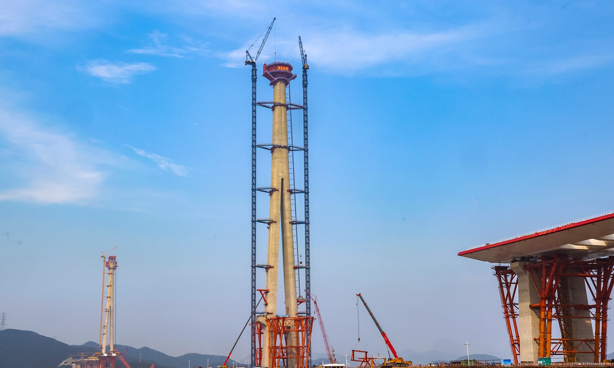 The No.4 main tower of the Xihoumen highway-railway bridge in Zhoushan, East China's Zhejiang Province is topped out on July 19, 2026, completing the tower structure for the world's longest-span combined highway-railway bridge. Photo: VCG