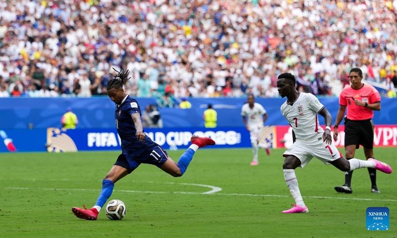 Michael Olise (L) of France shoots the ball during the bronze final match between France and England at the 2026 FIFA World Cup in Miami, the United States, July 18, 2026. (Xinhua/Hu Xingyu)