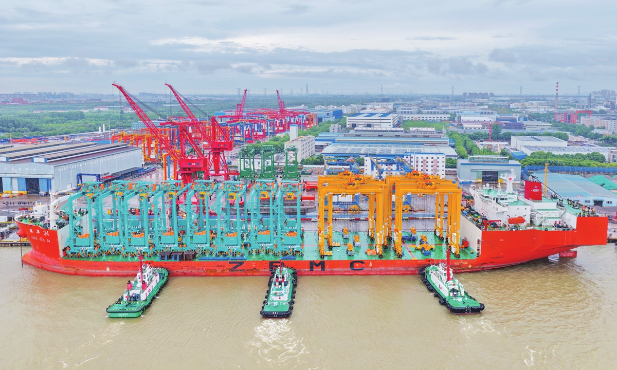 The vessel Zhenhua 34, carrying 14 rubber-tired gantry cranes, departed from Nantong Port in East China's Jiangsu Province on July 5, 2026, bound for ASEAN destinations including Malaysia, to support the smart upgrading of ports in Belt and Road partner countries. Photo: VCG
