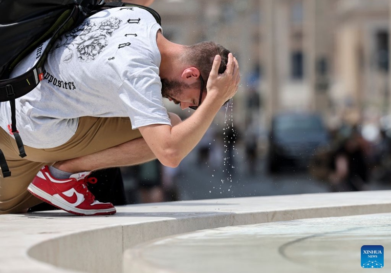 A tourist cools off at a street fountain amid a heatwave in Rome, Italy, July 19, 2026. A new heatwave is sweeping Italy, with many major cities, including the capital Rome, under red heat alerts. The scorching conditions are forecast to last until next week. Photo: Xinhua