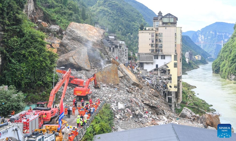 Rescuers work at the site of a mountain collapse in Pengshui Miao and Tujia Autonomous County of Chongqing, southwest China, July 19, 2026. A rainfall-induced mountain collapse occurred at 9:08 a.m. on Friday in the Hanjia sub-district of Pengshui, burying more than 10 residential buildings, while leaving some local residents trapped and unaccounted for.
China activated a Level-II national emergency response for geological disasters. Multiple rescue forces including emergency response, fire control and public security rushed to the scene and launched full-scale search and rescue operations, while local residents also volunteered to take part in the rescue efforts. Photo: Xinhua