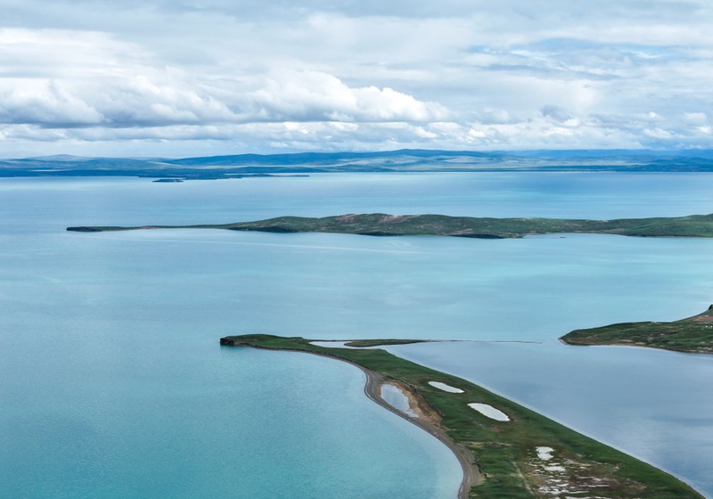 An aerial drone photo taken on July 12, 2026 shows a view of the Ngoring Lake in Golog Tibetan Autonomous Prefecture of northwest China's Qinghai Province. (Xinhua/Zhang Long)