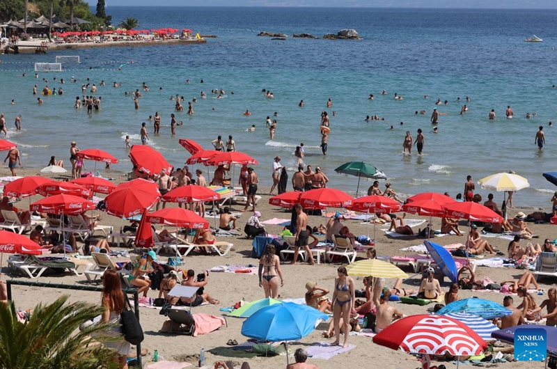 People enjoy leisure time at Bacvice Beach in Split, Croatia, on July 19, 2026. (Ivana Ivanovic/PIXSELL via Xinhua)