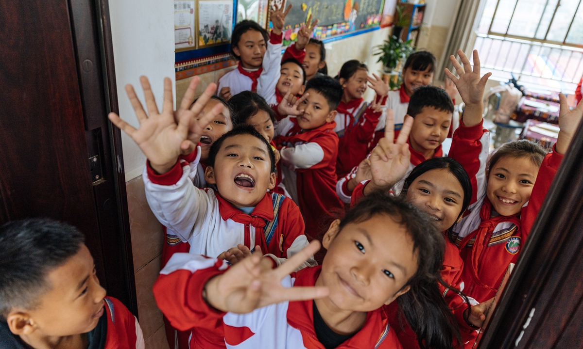 Students cheer for the camera at Medog Complete Primary School in Nyingchi, Southwest China's Xizang Autonomous Region. Photo: Li Hao/GT