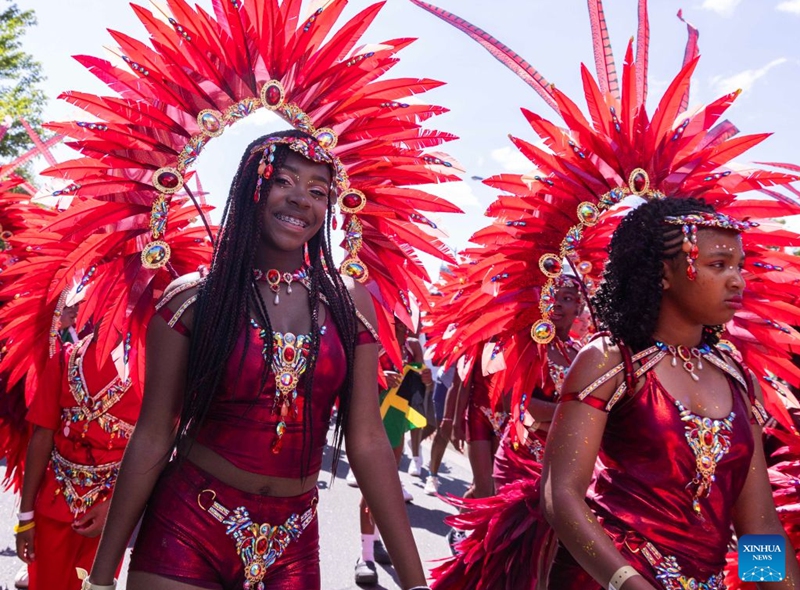 Dressed-up girls are seen during the Junior Carnival Parade of the 2026 Toronto Caribbean Carnival in Toronto, Canada, on July 19, 2026. Thousands of young participants in vivid costumes took part in the parade, celebrating Caribbean culture through music and dance. (Photo by Zou Zheng/Xinhua)