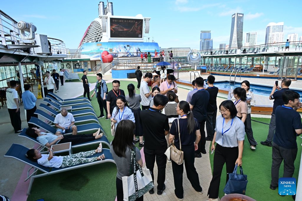 People take part in a cruise tour event aboard cruise ship Dream at Qingdao International Cruise Terminal in Qingdao, east China's Shandong Province, July 20, 2026. As a part of the 36th Qingdao International Beer Festival, a cruise tour event kicked off at the Qingdao International Cruise Terminal on Monday. Featuring live performances and interactive experiences, this event created an immersive maritime leisure space for visitors. (Xinhua/Li Ziheng)