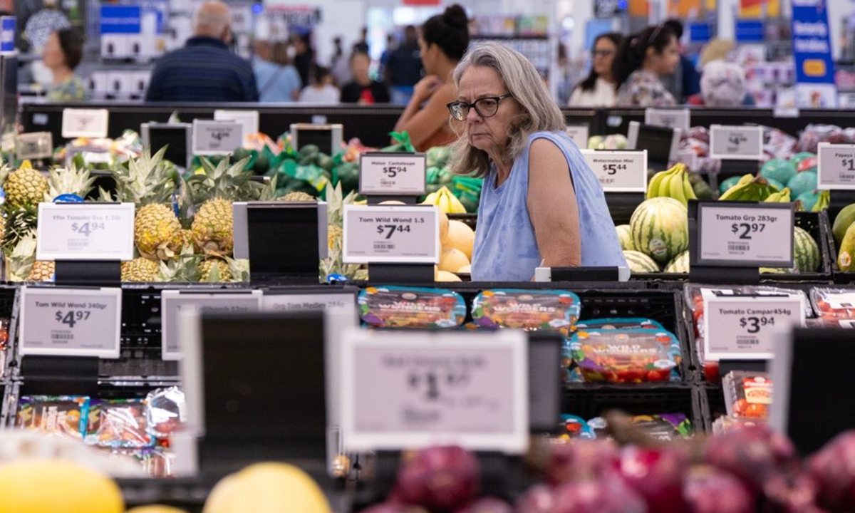 A customer shops at a Walmart store in Toronto, Canada, July 20, 2026. Canada's Consumer Price Index (CPI) increased 2.8 percent year over year in June, following a 3.2 percent gain in May, Statistics Canada said Monday. (Photo by Zou Zheng/Xinhua)