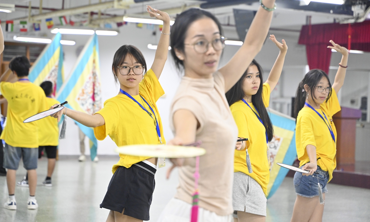 Fifty overseas Chinese teenagers from various countries and regions practice the performance skills of Cantonese Opera in Guangzhou, South China's Guangdong Province, on July 21, 2026. These young people, hailing from Denmark, the Netherlands, Spain, Germany, Vietnam, France, Oman and beyond, embarked on a 10-day educational tour in China. Photo: VCG