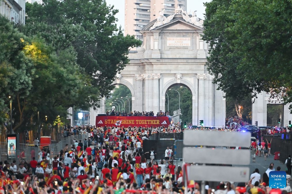 Fans gather during the celebrations after team Spain won the 2026 FIFA World Cup in Madrid, Spain, on July 20, 2026. (Photo by Gustavo Valiente/Xinhua)