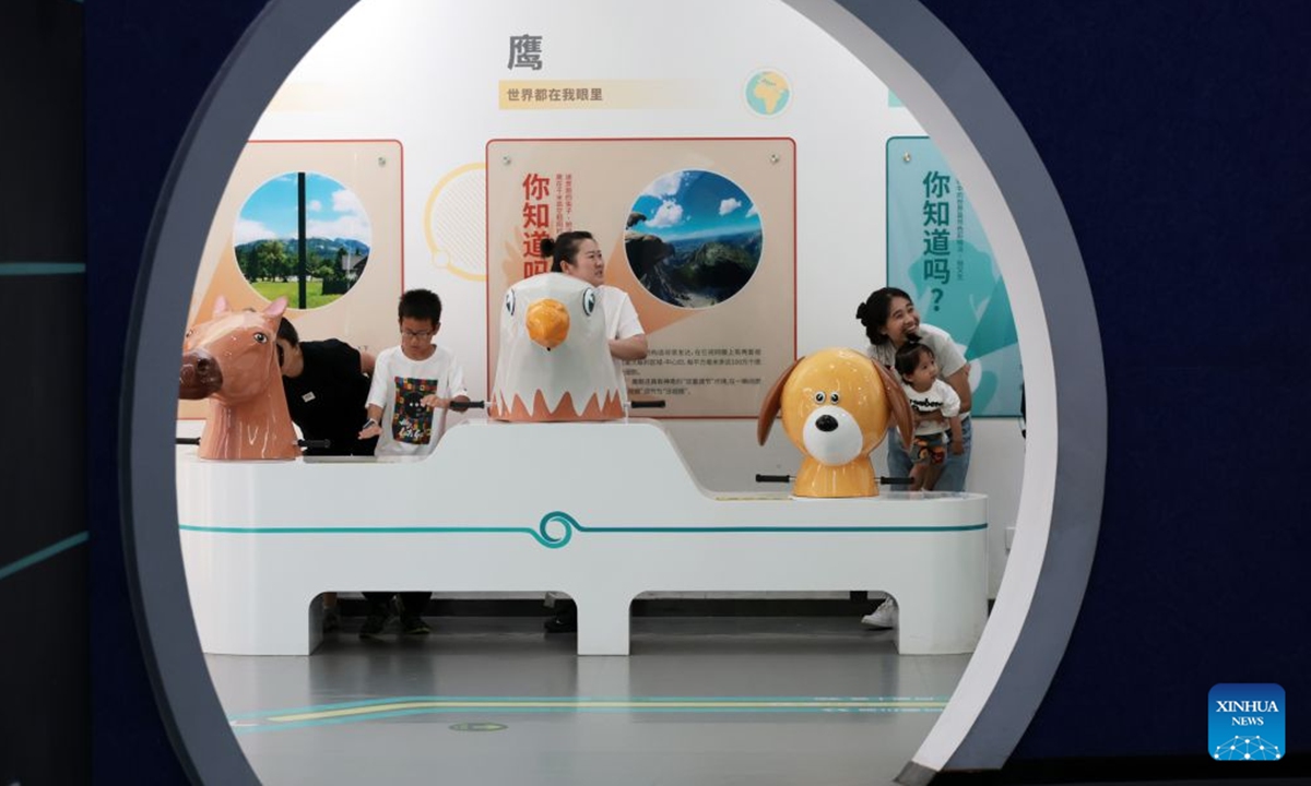 Visitors learn about eye health through exhibits at Liaoning Science and Technology Museum in Shenyang, northeast China's Liaoning Province, July 19, 2026.
Many students came to Liaoning Science and Technology Museum during the summer holiday season to boost their scientific literacy through interactive exhibits and hands-on science experiments. (Xinhua/Li Gang)