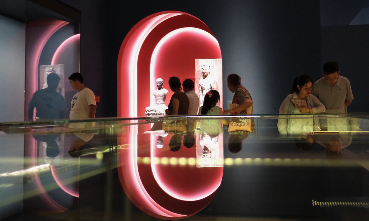Parents and children visit an exhibition on the culture of Dunhuang at the Hunan Provincial Museum in Changsha, Central China's Hunan Province on July 21, 2026. Photo: VCG