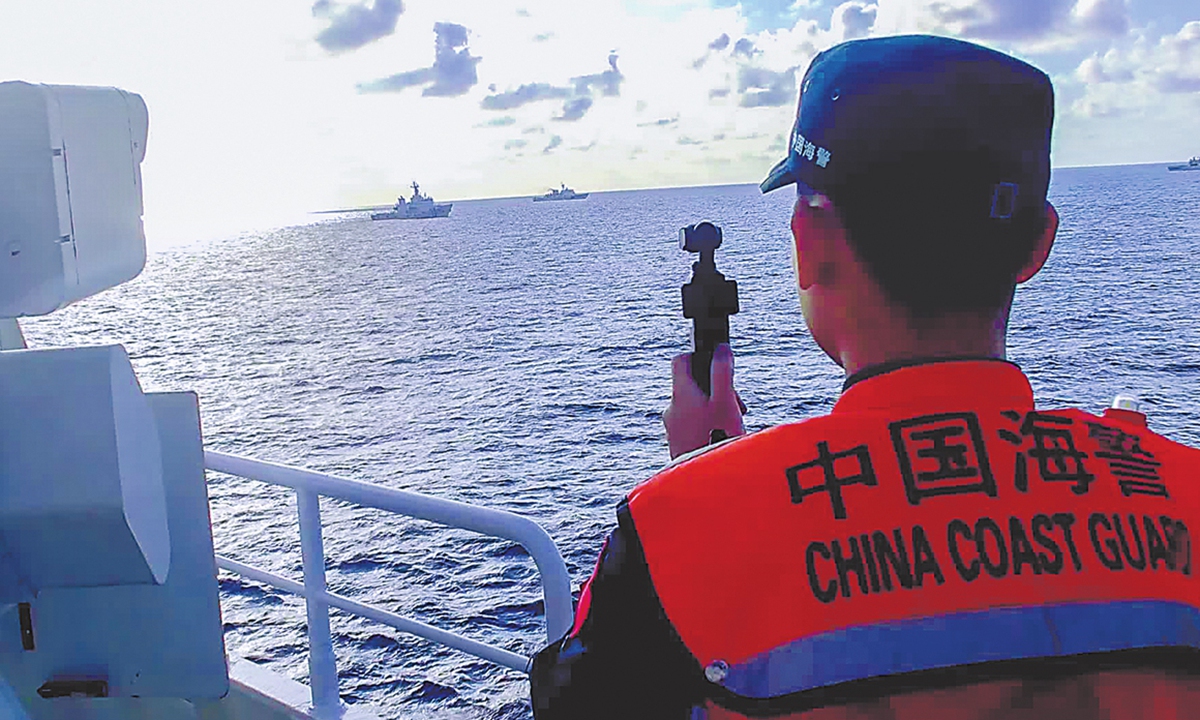 Out of humanitarian considerations, the Chinese side permitted the transfer of injured personnel from the Philippines' illegally grounded warship BRP Sierra Madre at Ren'ai Jiao, on the morning of July 21, 2026. A CCG officer monitored the full process of transfer. Photo: Courtesy of the CCG