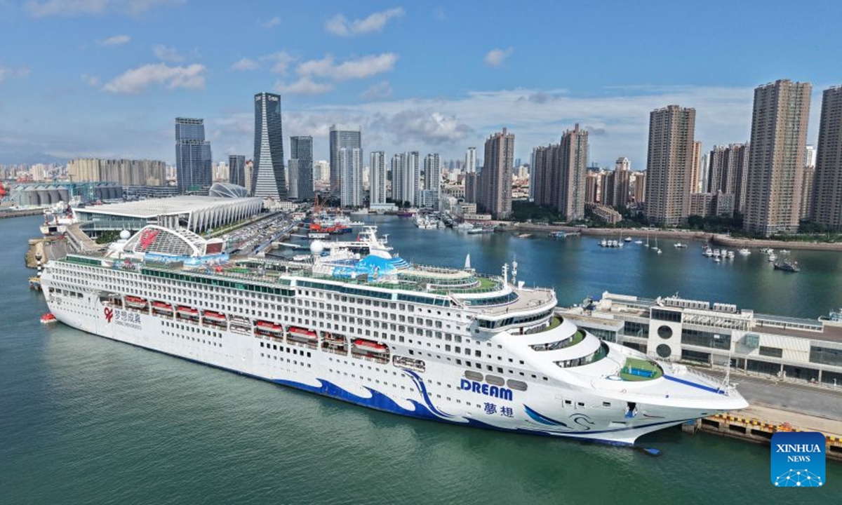 An aerial drone photo taken on July 20, 2026 shows the cruise ship Dream, a maritime sub-venue of the 36th Qingdao International Beer Festival, berthing at Qingdao International Cruise Terminal in Qingdao, east China's Shandong Province. As a part of the 36th Qingdao International Beer Festival, a cruise tour event kicked off at the Qingdao International Cruise Terminal on Monday. Featuring live performances and interactive experiences, this event created an immersive maritime leisure space for visitors. (Xinhua/Li Ziheng)