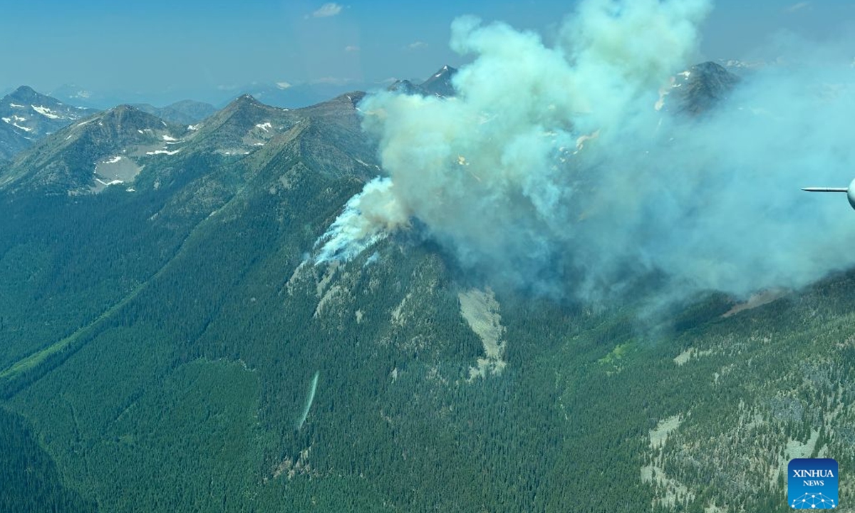 An aerial photo provided by the BC Wildfire Service on July 18 shows a wildfire near Kimberley in southeastern British Columbia, Canada. Latest statistics show a total of 3,839 wildland fires have been recorded across Canada so far this year, consuming more than 2.9 million hectares of forest. (BC Wildfire Service/Handout via Xinhua)