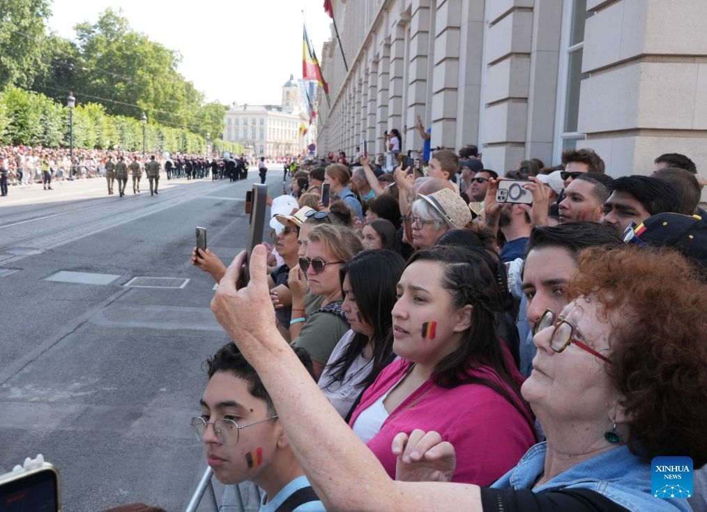 People watch a military and civil parade of Belgian National Day celebrations in Brussels, Belgium, on July 21, 2026. (Xinhua/Weng Xinyang)