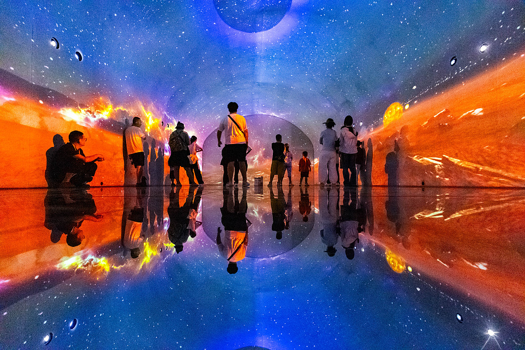 Visitors immerse themselves in