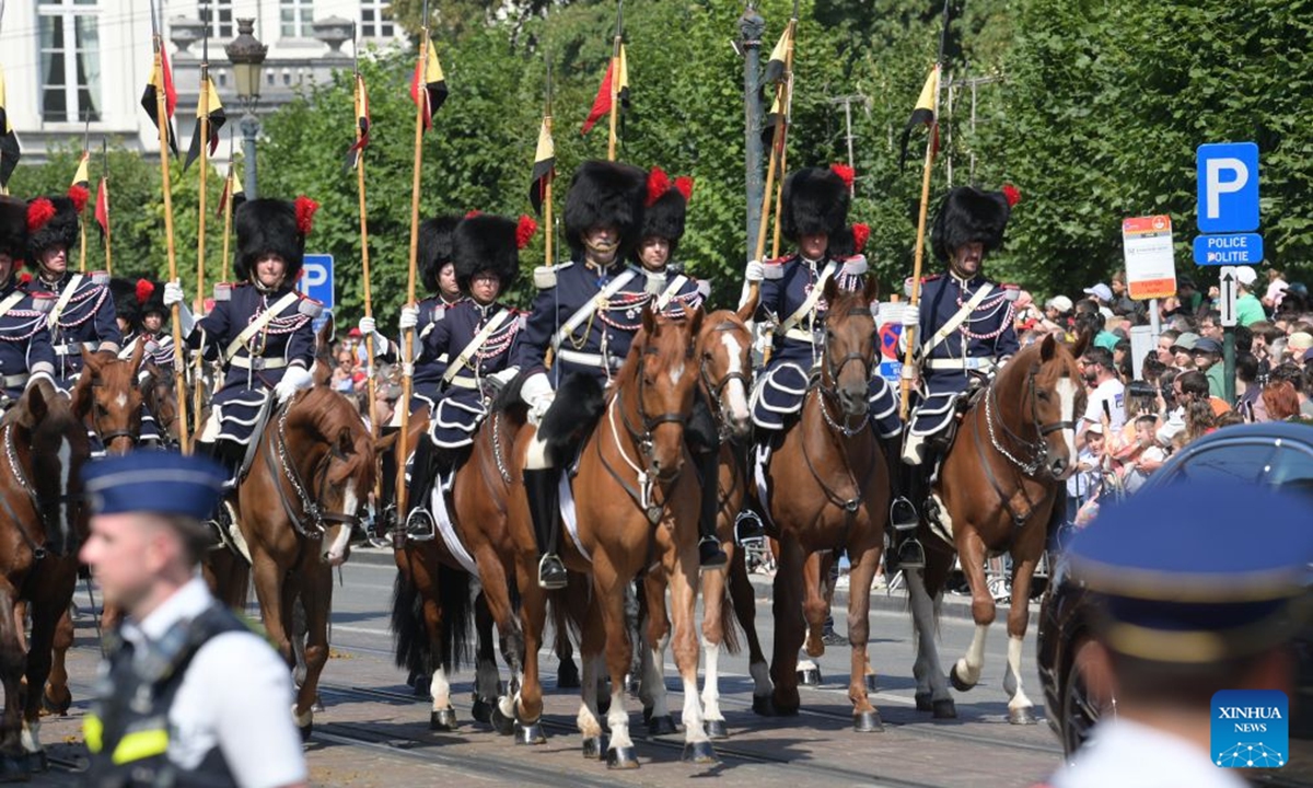 Cavalrymen march during a military and civil parade of Belgian National Day celebrations in Brussels, Belgium, on July 21, 2026. (Xinhua/Weng Xinyang)