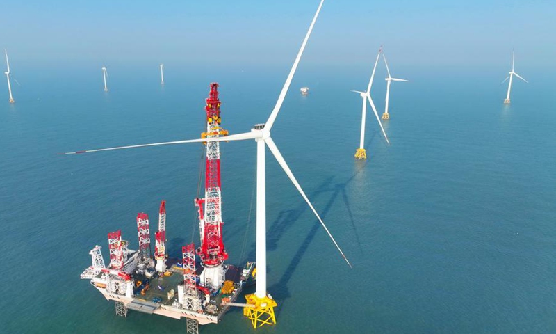 A drone photo taken on Jan. 13, 2026 shows the construction site of a 20-megawatt offshore wind turbine unit in the coastal waters of southeast China's Fujian Province. (Xinhua/Lin Shanchuan)

