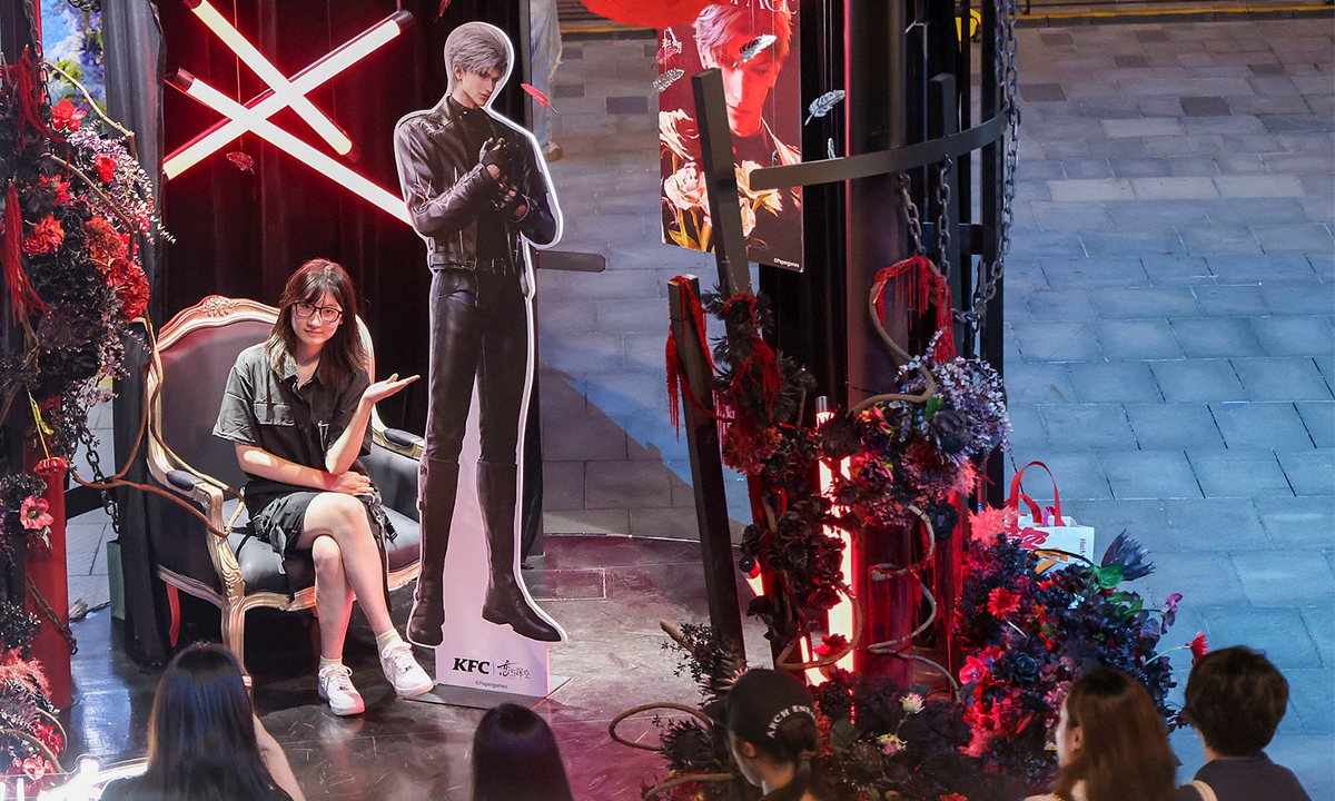 A player visits a booth for the mobile game Love and Deepspace at the North Bund in Shanghai.