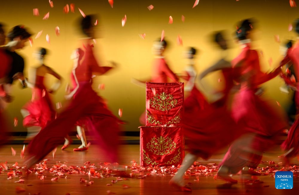 Artists of the National Ballet of China perform during a dressed rehearsal of The Peony Pavilion in Beijing, capital of China, July 21, 2026. The ballet drama is officially staged here from July 22 to 26. (Xinhua/Jin Liangkuai)