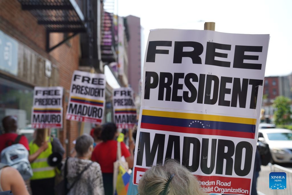 Supporters of Venezuelan President Nicolas Maduro protest outside a courthouse in New York, the United States, July 22, 2026. Venezuelan President Nicolas Maduro and his wife Cilia Flores will go on trial starting on June 1, 2027, a U.S. judge ruled on Wednesday.

The couple, who pleaded not guilty to drug trafficking and firearms charges, made their third appearance in a New York court after the forcible seizure by U.S. troops in a military raid in early January. (Xinhua/Zhang Fengguo)