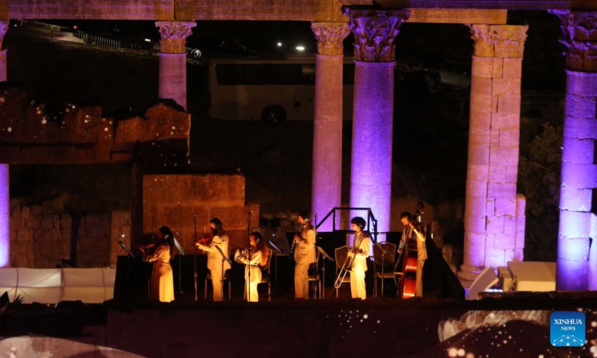 Artists perform at a theater of Jerash archaeological site during the 40th Jerash Festival for Culture and Arts in Jerash, Jordan, July 22, 2026. Jordan's Jerash Festival for Culture and Arts will mark its 40th edition from July 22 to Aug. 2, turning the ancient Roman city of Jerash into a vibrant hub for cultural exchange, artistic expression and civilizational dialogue. (Photo by Mohammad Abu Ghosh/Xinhua)