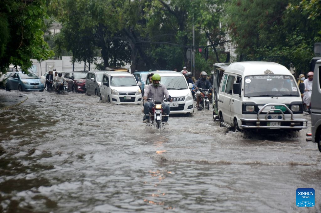 Vehicles move on a flooded street after heavy monsoon rains in Lahore, Pakistan, July 22, 2026.

At least eight people were killed and 16 others injured in rain-related incidents across Pakistan over the past 24 hours as monsoon showers continued to batter parts of the country, the National Disaster Management Authority said on Tuesday. (Photo by Sajjad/Xinhua)