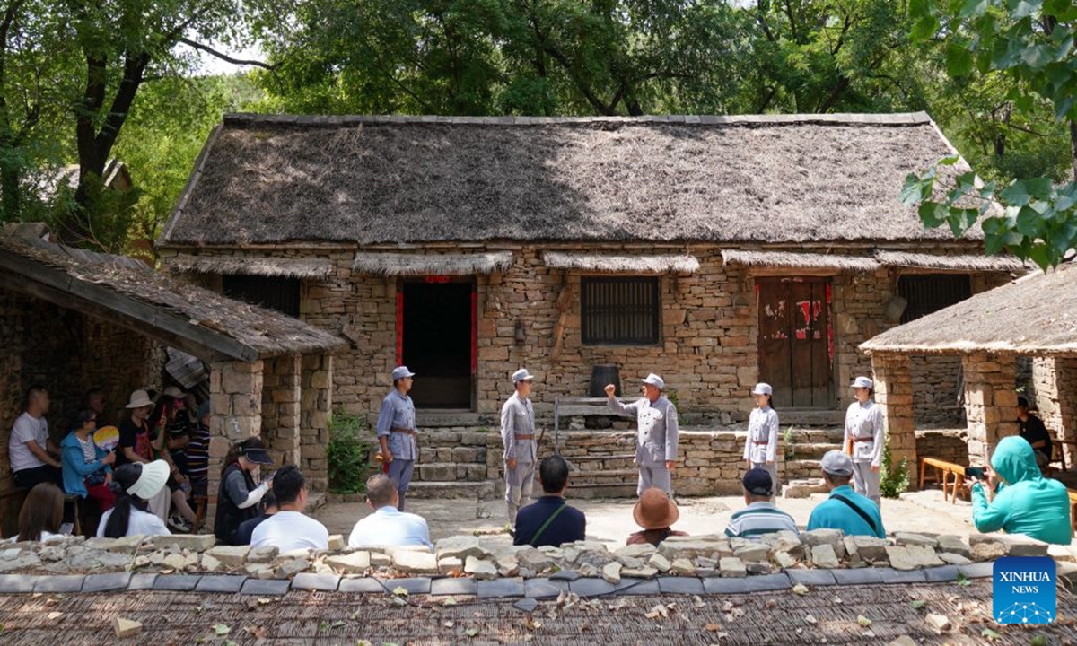 Villagers perform a short play in Yinan County, Linyi City, east China's Shandong Province, June 10, 2026. (Xinhua)