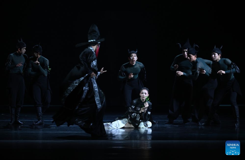 Artists of the National Ballet of China perform during a dressed rehearsal of The Peony Pavilion in Beijing, capital of China, July 21, 2026. The ballet drama is officially staged here from July 22 to 26. (Xinhua/Jin Liangkuai)
